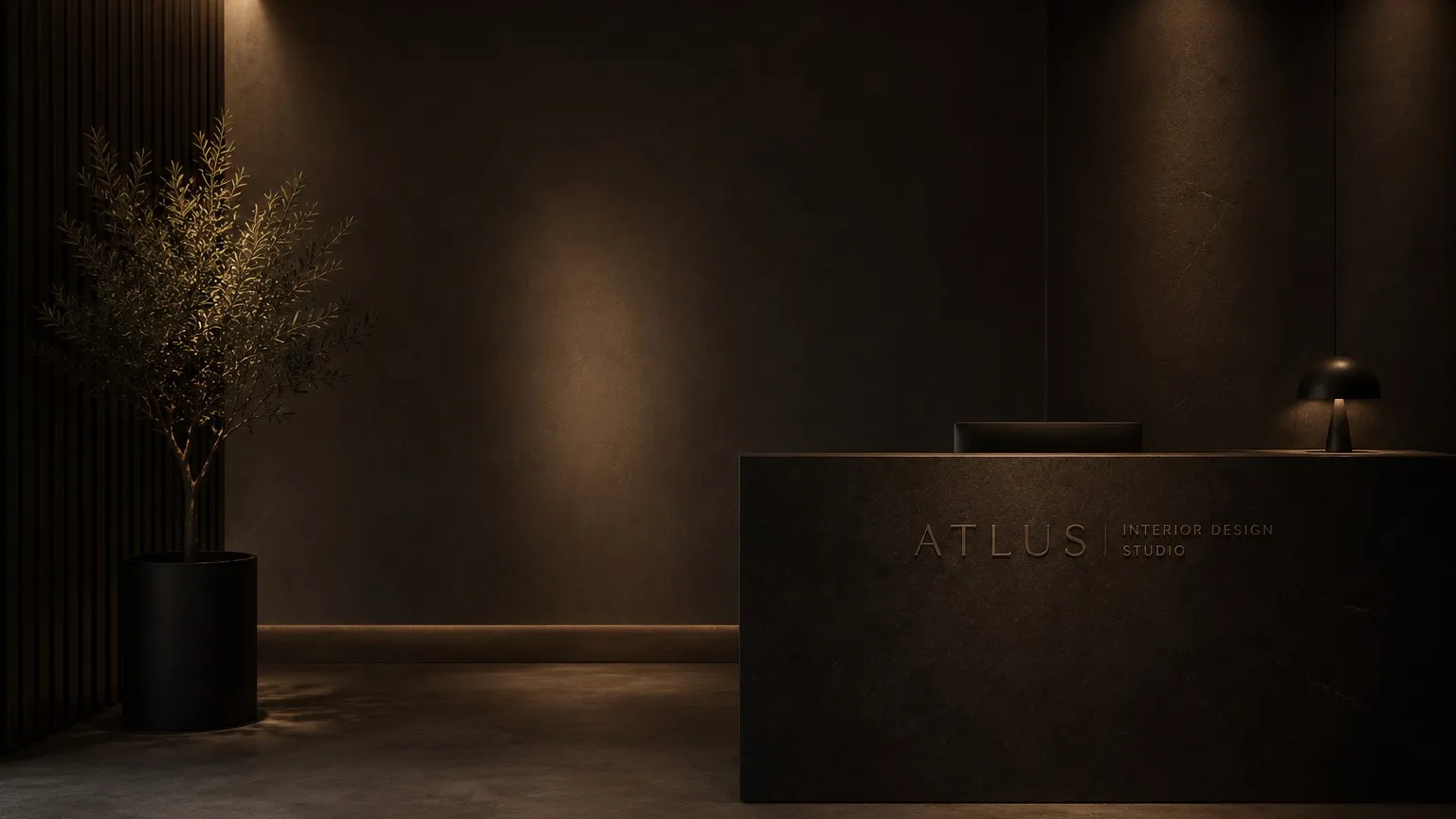 Reception desk in dark stone, lit low